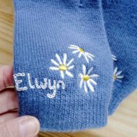 Cashmere-daisy-gloves-personalised-embroidery.jpg