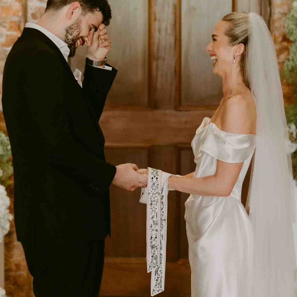 StephieAnn-custom-wedding-embroidery-hand-tieing-ribbon